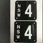 Sebuah plat nomor mobil klasik "NSW 4" terjual dalam sebuah pelelagan di Sydney, Australia, 29 Agustus lalu, sebesar Rp 26 miliar (Foto: CarAdvice).