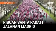 Ribuan pelari mengenakan kostum Santa Claus dan peri Natal memadati jalanan pusat Kota Madrid, Spanyol hari Minggu, dalam ajang lari amal tahunan Santa Charity Run.