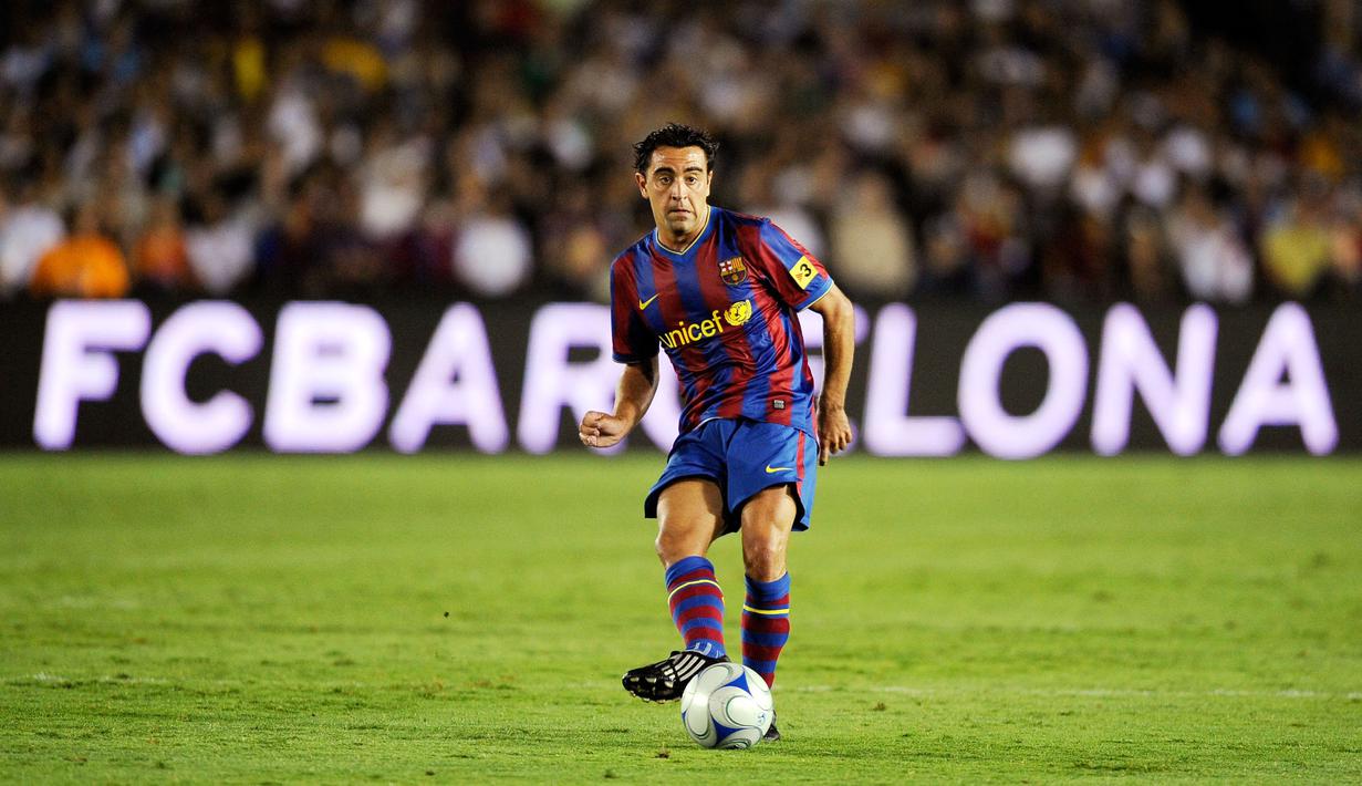 Xavi bisa dibilang salah satu gelandang terbaik dari generasinya. menghabiskan 17 musim dengan Barcelona, ia memiliki kesempatan untuk bekerja dengan Pep Guardiola dengan membuat 208 penampilan. Mereka juga mampu merebut titel Trebel Winner pada 2008/09. (AFP/Kevork Djansezian)