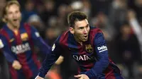 Lionel Messi bersorak gembira usai cetak gol ke gawang Atletico Madrid (LLUIS GENE / AFP)