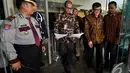  Menteri Hukum dan Hak Asasi Manusia Yasonna Hamongan Laoly bersama Sekretaris Kabinet Andi Widjajanto saat keluar dari Gedung KPK, Jakarta, Kamis (18/12/2014). (Liputan6.com/Miftahul Hayat)
