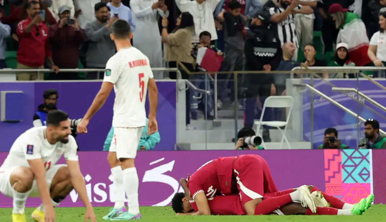 Kemenangan atas Iran 2-3, memastikan Qatar melaju ke laga puncak Piala Asia 2023. (HECTOR RETAMAL/AFP)
