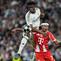 Pemain Real Madrid Aurelien Tchouameni (atas) dan pemain Bayern Munchen Serge Gnabry berebut bola pada laga leg pertama perempat final Liga Champions antara Real Madrid vs Bayern Munchen di Madrid, Spanyol, Selasa, 7 April 2026. (AP Photo/Bernat Armangue)
