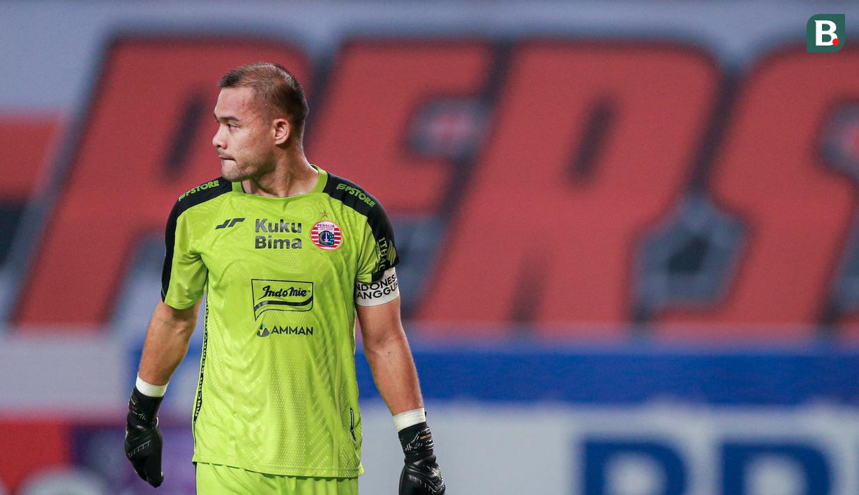 Kiper Persija Jakarta, Andritany Ardhiyasa saat pertandingan pekan ketujuh BRI Liga 1 2023/2024 melawan Borneo FC yang berlangsung di Stadion Patriot Candrabhaga, Bekasi, Rabu (9/8/2023). (Bola.com/Bagaskara Lazuardi)
