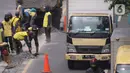 Pekerja melakukan penataan di ruas jalan nasional di Jalan Daan Mogot, Kota Tangerang, Banten, Selasa (15/2/2022). Pemkot Tangerang berencana melakukan sistem satu arah di Jalan Daan Mogot untuk mengatasi kemacetan di akses masuk tol Cengkareng-Batu Ceper-Kunciran. (Liputan6.com/Angga Yuniar)