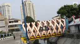 Tampilan Jembatan Ketupat di Jalan Gajah Mada, Petojo, Jakarta, Kamis (8/8/2019). Jembatan Ketupat memiliki bentang 12,5 meter dan lebar 2,5 meter dengan waktu pengerjaan selama 45 hari. (Liputan6.com/Helmi Fithriansyah)