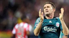 Liverpool's striker Robbie Keane misses a shot on goal against Atletico Madrid during their Champions League match at Vicente Calderon in Madrid on October 22, 2008. AFP PHOTO/PIERRE-PHILIPPE MARCOU