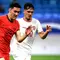 Pemain Timnas Indonesia, Shayne Pattynama (kanan) berebut bola dengan pemain China, Behram Abduweli saat laga lanjutan putaran ketiga Grup C Kualifikasi Piala Dunia 2026 di Qingdao Youth Stadium, Qingdao, China, Selasa (15/10/2024). (AFP)