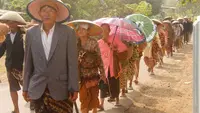 Masyarakat adat dan penganut Islam Kejawen di Kalikudi, Kecamatan Adipala, Kabupaten Cilacap, menggelar tradisi Pudunan.  (Foto: Liputan6.com/Muhamad Ridlo)