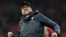 Ekspresi Jurgen Klopp pastikan kemenangan pada laga lanjutan Premier League yang berlangsung di Stadion Anfield, Liverpool, Minggu (31/3). Liverpool menang 2-1 atas Tottenham Hotspur. (AFP/Paul Ellis)