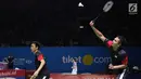 Pebulu tangkis ganda putra Indonesia, M Ahsan/Hendra Setiawan saat melawan Hiroyuki Endo/Yuta Watanabe (Jepang) di di Babak 8 besar Indonesia Open 2019 di Istora Senayan, Jakarta, Jumat (19/7/2019). Hendra/Ahsan unggul 21-15, 9-21, 22-20. (Liputan6.com/Helmi Fitrhiansyah)