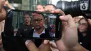 Pemanggilan kali ini menjadi yang ketiga bagi Ishfah Abidal Aziz alias Gus Alex. Tampak dalam foto, mantan staf khusus Menteri Agama periode 2019-2024, Yaqut Cholil Qoumas, Ishfah Abidal Aziz alias Gus Alex berjalan meninggalkan Gedung Merah Putih Komisi Pemberantasan Korupsi (KPK), Jakarta, Senin (26/1/2026). (Liputan6.com/Helmi Fitrhiansyah)