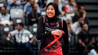 Pemain Red Sparks, Megawati Hangestri tersenyum saat menghadapi tim putri Indonesia All Star pada laga ekshibisi bola voli fun volleyball di Indonesia Arena, Senayan, Jakarta, Sabtu (20/4/2024). Red Sparks menang 3-2 (25-17, 25-15, 19-25, 18-25 dan 15-12). (Bola.com/Bagaskara Lazuardi)