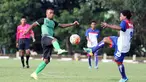 Pemain PS TNI, Manahati Lestusen (kiri) berebut bola dengan pemain Uni Papua pada laga uji coba di Mako Kostrad, Cilodong, Jawa Barat, (14/7/2016). (Bola.com/Nicklas Hanoatubun)