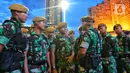 Personel TNI saat apel persiapan pengamanan perayaan malam Tahun Baru 2023 di Bundaran HI, Jakarta, Sabtu (31/12/2022). Pemprov DKI Jakarta telah menyiapkan tujuh titik panggung kemeriahan untuk menyambut tahun baru 2023.  (Liputan6.com/Angga Yuniar)