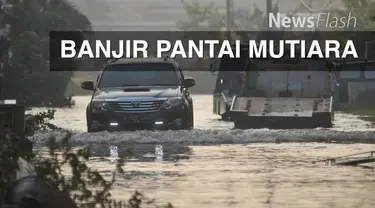 Banjir akibat rob mengakibatkan jebolnya tanggul dan merendam permukiman Pantai Mutiara, Pluit, Penjaringan, Jakarta Utara, sudah surut. Jalan-jalan di Kawasan tersebut sudah bisa dilalui.