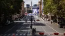 Untuk memulai momen bersejarah di ibu kota Prancis ini, sebuah parade megah akan berlangsung di sepanjang jalan Champs-Elysees. (Dimitar DILKOFF / AFP)