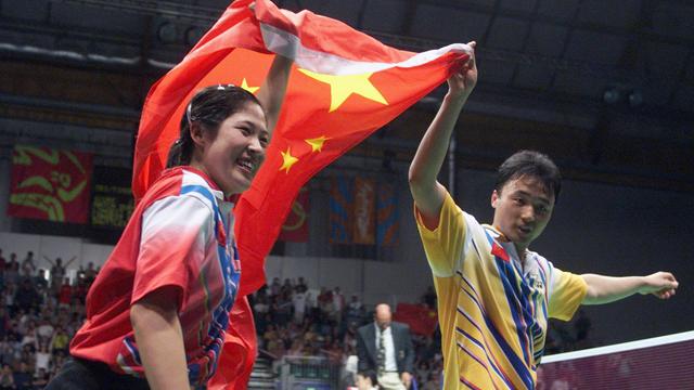 Gao Ling (kiri) and Zhang Jun, Olimpiade 2000. (AFP/Robyn Beck)