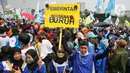 Ketika itu, para pekerja menuntut adanya pengurangan jam kerja menjadi delapan jam sehari tanpa pengurangan upah. (Liputan6.com/Angga Yuniar)