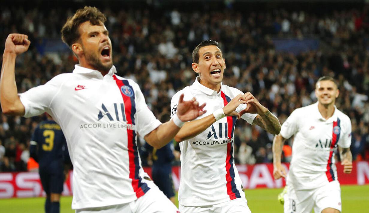 Penyerang Paris Saint-Germain, Angel Di Maria, melakukan selebrasi usai membobol gawang Real Madrid pada laga Liga Champions di Stadion Parc des Princes, Rabu (18/9/2019). PSG menang 3-0 atas Real Madrid. (AP/Francois Mori)