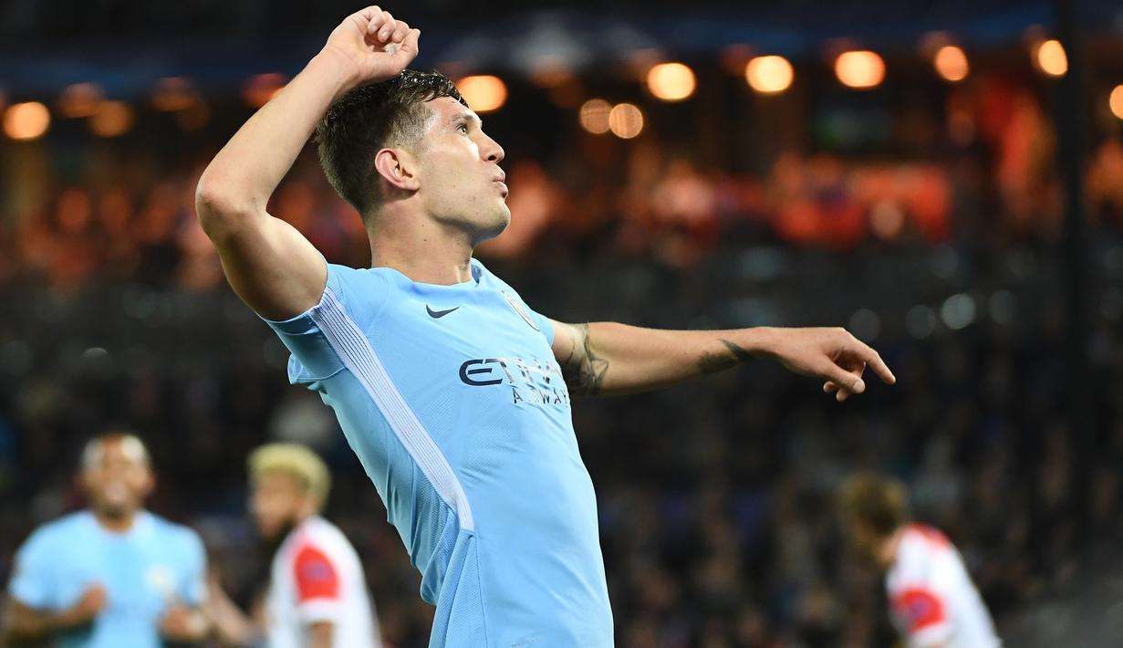 Bek John Stones mencatatkan namanya pada deretan top scorer Manchester City dengan tiga gol untuk semua kompetisi. (AFP/Emmanuel Dunand)