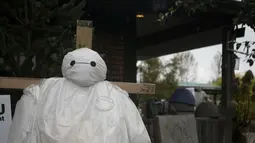 Sebuah orang-orangan sawah ditampilkan dalam Festival Orang-orangan Sawah tahunan jelang perayaan Halloween di Langley, British Columbia, Kanada (19/10/2020). (Xinhua/Liang Sen)