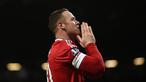 Ekspresi Wayne Rooney setelah Manchester United menang atas Stoke City 3-0 dalam lanjutan Liga Inggris di Stadion Old Trafford, Manchester, Rabu (3/2/2016) dini hari WIB. (AFP/Paul Ellis)