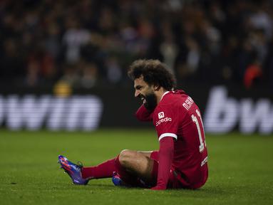 Reaksi penyerang Liverpool Mohamed Salah saat bertandang ke markas Toulouse pada pekan ke-4 Grup E Liga Europa 2023/2024 di Stadium de Toulouse, Jumat (10/11/2023) WIB. (AP Photo/Thibault Camus)
