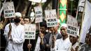 Massa yang tergabung dari berbagai forum Islam berunjuk rasa di depan Balai Kota, Jakarta, Jumat (24/10/2014) (Liputan6.com/Faizal Fanani)