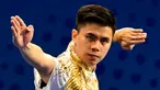 Aksi atlet wushu asal Indonesia Edgar Xavier Marvelo saat berkompetisi pada nomor wushu final changquan putra Asian Games 2023 di Hangzhou, China, Minggu (24/9/2023). (Ishara S. KODIKARA/AFP)