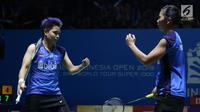 Pebulu tangkis ganda putri Indonesia, Greysia Polii/Apriyani Rahayu bersorak saat melawan Kim So Yeong/Kong Hee Yong (Korsel) di babak 16 besar Indonesia Open 2019 di Istora Senayan, Jakarta, Kamis (18/7/2019). Greysia/Apriyani kalah 20-22, 21-18, 13-21. (Liputan6.com/Helmi Fithriansyah)