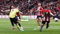Pertandingan Liga Inggris 2023//2024 antara Sheffield United kontra Burnley hari Sabtu (20/04/2024) malam WIB. (DARREN STAPLES / AFP)