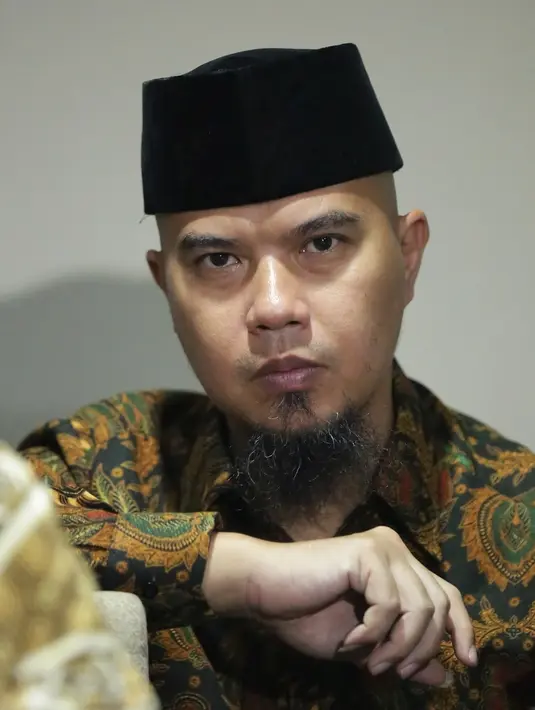 "Siapa yang dukung penista agama adalah bajingan yang perlu diludahi mukanya-ADP," tulis Dhani, Minggu (5/3/2017). (Nurwahyunan/Bintang.com)