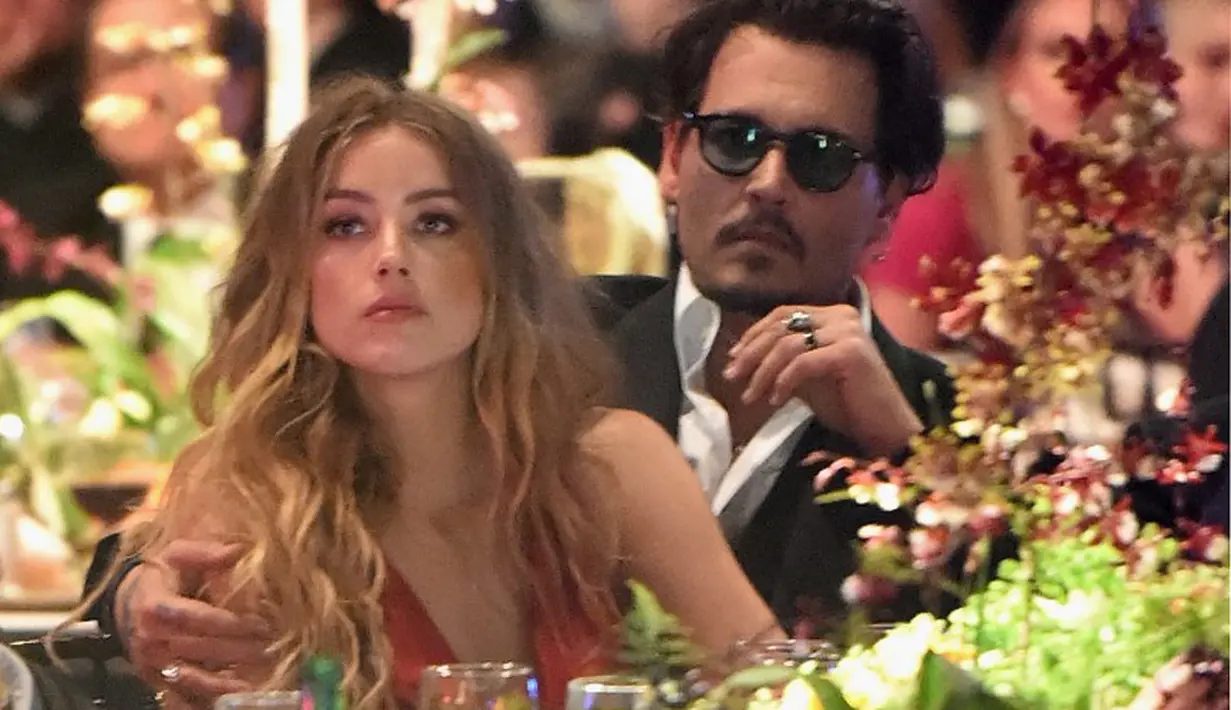 Proses cerai Johnny Depp dan Amber Heard telah mencapai titik akhir. Sebagai juru bicara dan tim kuasa dari pihak Depp, seorang pengacara wanita Laura Wasser memberikan kabar terbaru soal perceraiannya ini. (AFP/Bintang.com)