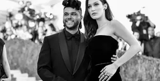 The Weeknd kini sedang menjadi perbincangan lantaran kembali berusaha mendekati Bella Hadid usai tak seberapa lama putus dari Selena Gomez. (MIKE COPPOLA/GETTY IMAGES NORTH AMERICA/AFP)