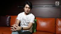 Aktor asal Jepang Koutaro Kakimoto membintang film Hujan Bulan Juni. (Helmi Afandi/Liputan6.com)