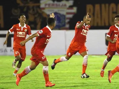 Ekspresi Raphael Maitimo sesaat setelah mencetak gol ke gawang PS TNI pada lanjutan Grup D Piala Jenderal Sudirman 2015 di Stadion Manahan, Solo, Selasa (15/12/2015). Persija menang 1-0 atas PS TNI. (Bola.com/Nicklas Hanoatubun)