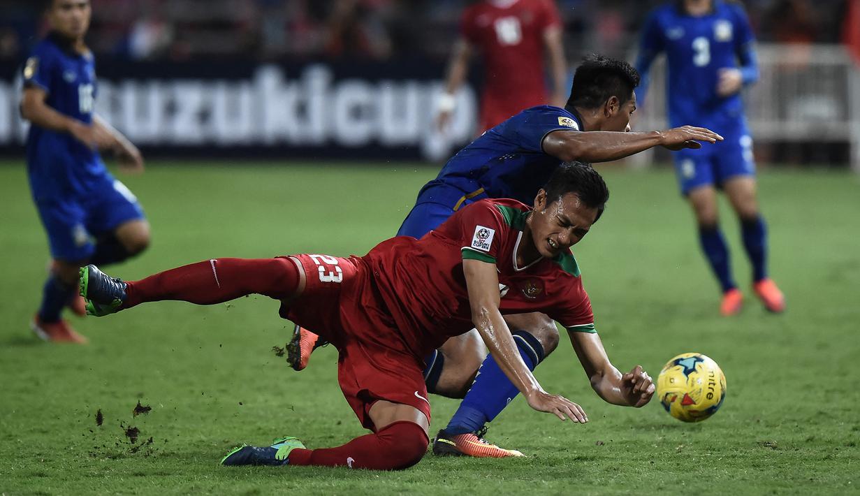 Di fase gugur Piala AFF, Timnas Indonesia total 7 kali menghadapi Thailand di edisi 1998, 2000, 2008, dan edisi 2016. Hasilnya, Timnas Garuda menang 2 kali dan kalah 5 kali. (AFP/Lillian Suwanrumpha)