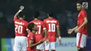 Bek Persija, M Rezaldi Hehanusa berdoa usai mencetak gol ke gawang PS TNI pada lanjutan Liga 1 Indonesia di Stadion Patriot Candrabhaga, Bekasi, Sabtu (30/9). Persija menang 4-1. (Liputan6.com/Helmi Fithriansyah)