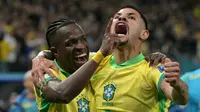 Brasil memastikan diri lolos ke Piala Dunia 2026. Vinicius Jr dan Bruno Guimaraes merayakan sukses ini di laga kontra Paraguay hari Rabu (11/06/2025) pagi WIB. (NELSON ALMEIDA / AFP)