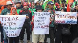 Ratusan buruh tersebut berunjuk rasa menolak rencana pemberlakuan program Tabungan Perumahan Rakyat (Tapera) untuk seluruh pekerja. (Liputan6.com/Angga Yuniar)