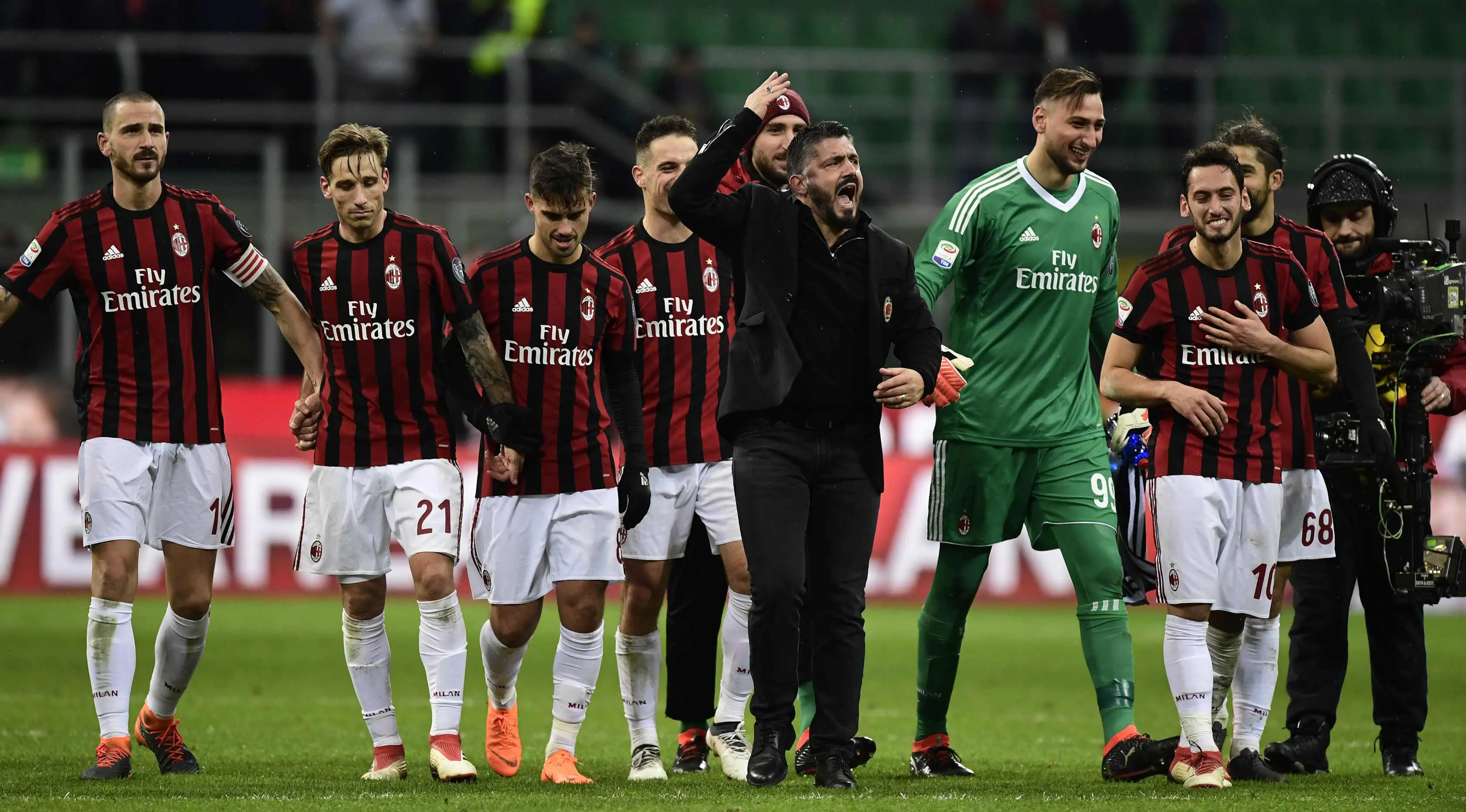 Gennaro Gattuso berteriak merayakan kemenangan AC Milan (AFP Photo/Miguel Medina)