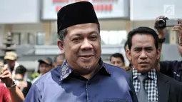 Wakil Ketua DPR RI Fahri Hamzah usai memenuhi panggilan di Mapolda Metro Jaya, Jakarta, Senin (19/3). Fahri menyatakan Sohibul Iman melakukan penyerangan di depan umum dengan menyebut dirinya pembohong dan pembangkang. (Merdeka.com/Iqbal S. Nugroho)