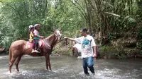 Wisata Susur Kampung dan Sungai Pagi Hari dengan Dewi Merapi. (Liputan6.com/Yanuar H).