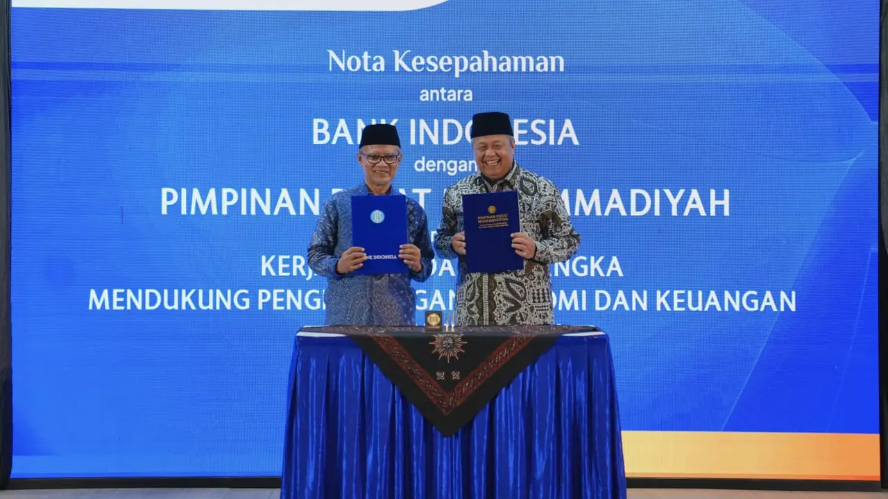 Gubernur Bank Indonesia, Perry Warjiyo dan Ketua Umum PP Muhammadiyah, Prof. Dr. H. Haedar Nashir, M.Si. di Kantor PP Muhammadiyah, Jakarta (6/8/2025). (Dok BI)