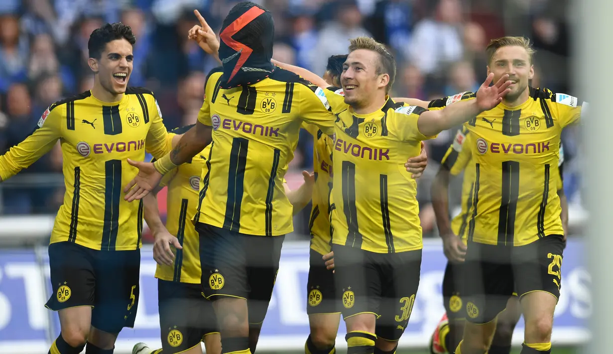 Karakter tersebut menggambarkan keganasan Aubameyang di kotak penalti lawan. Tak heran perhatian makin tersorot kepada penyerang bertipikal cepat tersebut. (AFP/Patrik Stollarz)
