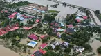 Foto udara menunjukkan area permukiman yang terendam banjir di Kangar, negara bagian Perlis, Malaysia utara, pada Kamis 27 November 2025. Hingga Kamis 27 November 2025, negara bagian utara dan timur Malaysia masih digenangi banjir parah. (Mohd RASFAN/AFP)