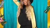 Sejak awal kehamilan, Beyonce memang tak pernah lepas dari perhatian publik, terutama soal sesi foto yang kerap dilakukannya. Belakangan tersiar kembali kabar yang mengejutkan dari penyanyi fenomenal ini. (Instagram/Beyonce)