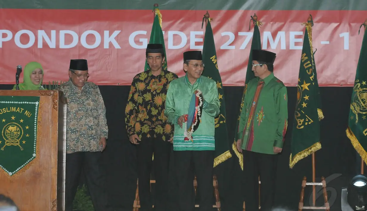 Wakil Presiden RI, Boediono, dan Gubernur DKI Jakarta, Joko Widodo, membuka Rakernas Perangkat Muslimat NU, Rabu (28/5/14). (Liputan6.com/Herman Zakharia)