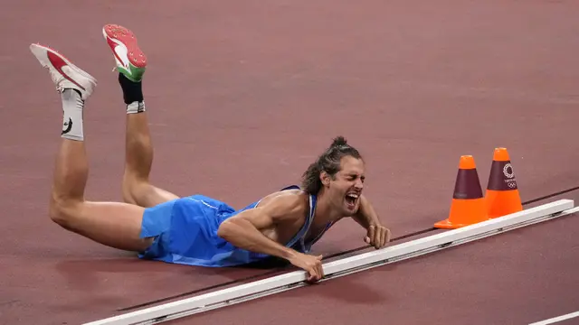 FOTO: Atlet Lompat Tinggi Qatar dan Italia Sepakat Berbagi Emas Olimpiade